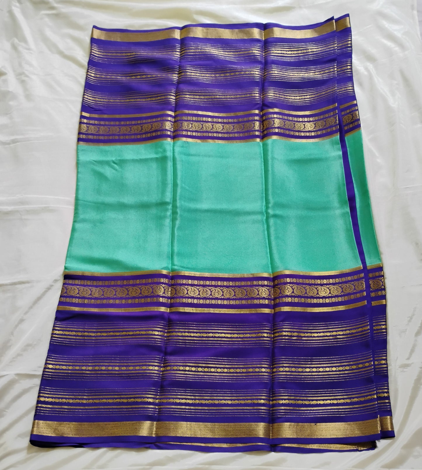 PureMysoreSilk Pista green with violetish-blue equal border Saree